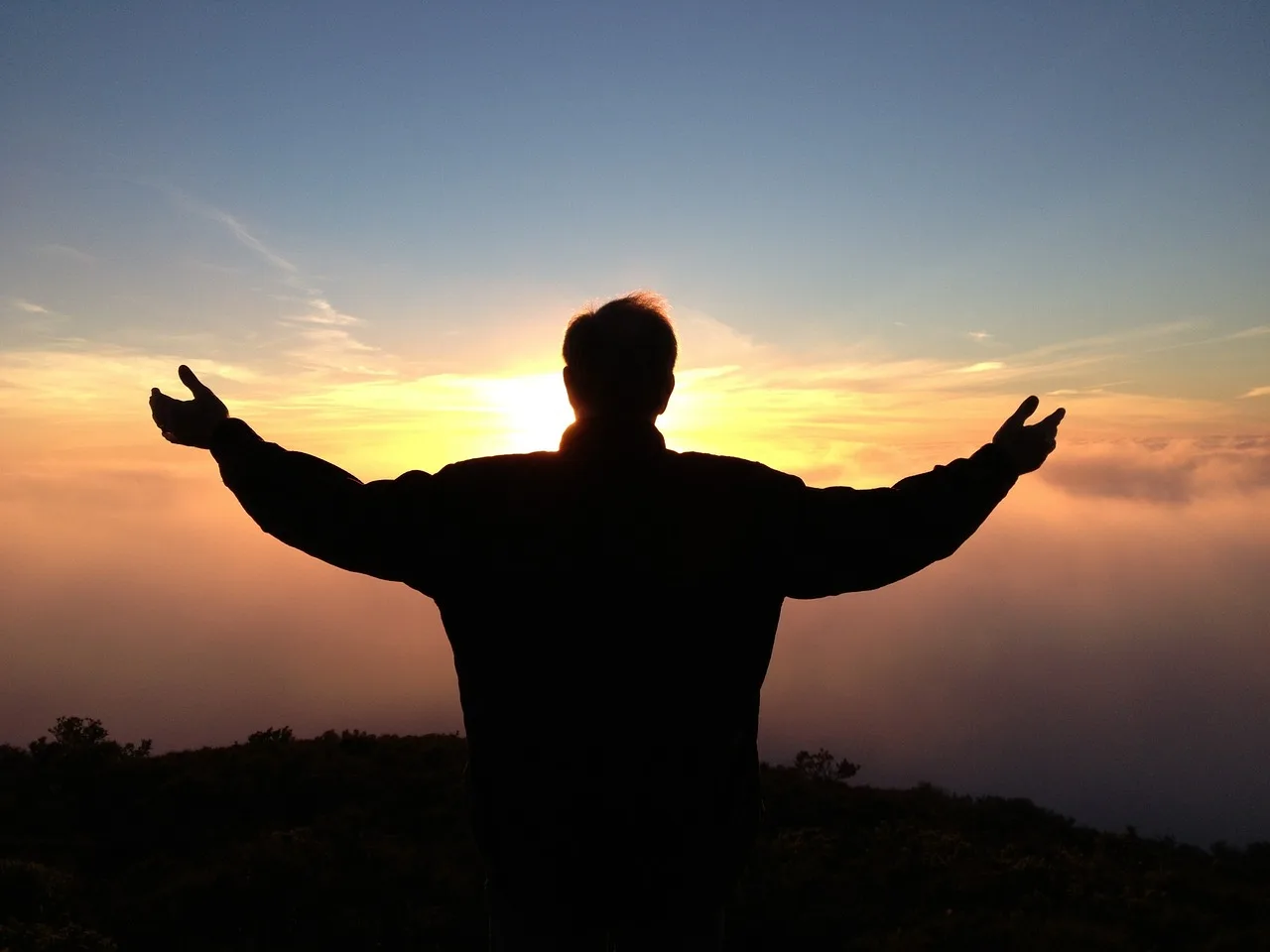 man facing sunset personal growth concept