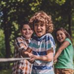 kids playing tug of war. Youth group retreat, concept image.